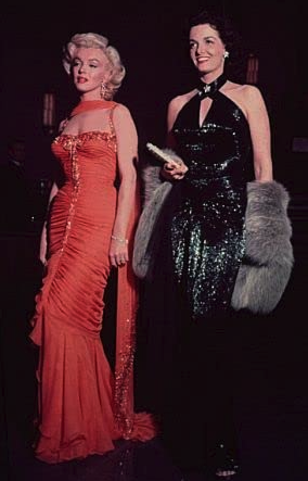 Marilyn Monroe (left) and Jane Russell (right), starts of Gentlemen Prefer Blondes (1953) sport their Travilla gowns on set. (Emerson Hall)