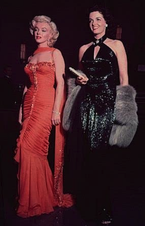 Marilyn Monroe (left) and Jane Russell (right), starts of "Gentlemen Prefer Blondes" (1953) sport their Travilla gowns on set. (Emerson Hall)