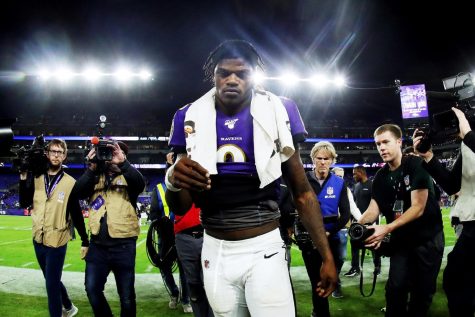 Lamar Jackson walks off the field after losing to the Titans in the 2020 Divisional Round. (Maddie Meyer)