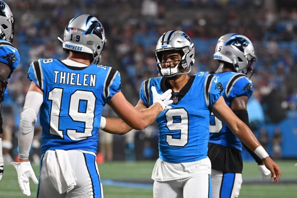 Bryce Young and Adam Theilen Celebrate After a Touchdown Pass. (Last Word on Sports)