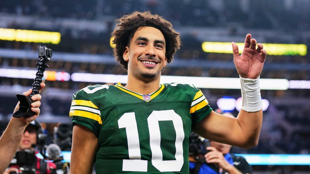 Jordan Love smiling big in front of the cameras after helping lead the Packers to his first career playoff win against the Dallas Cowboys (ESPN).