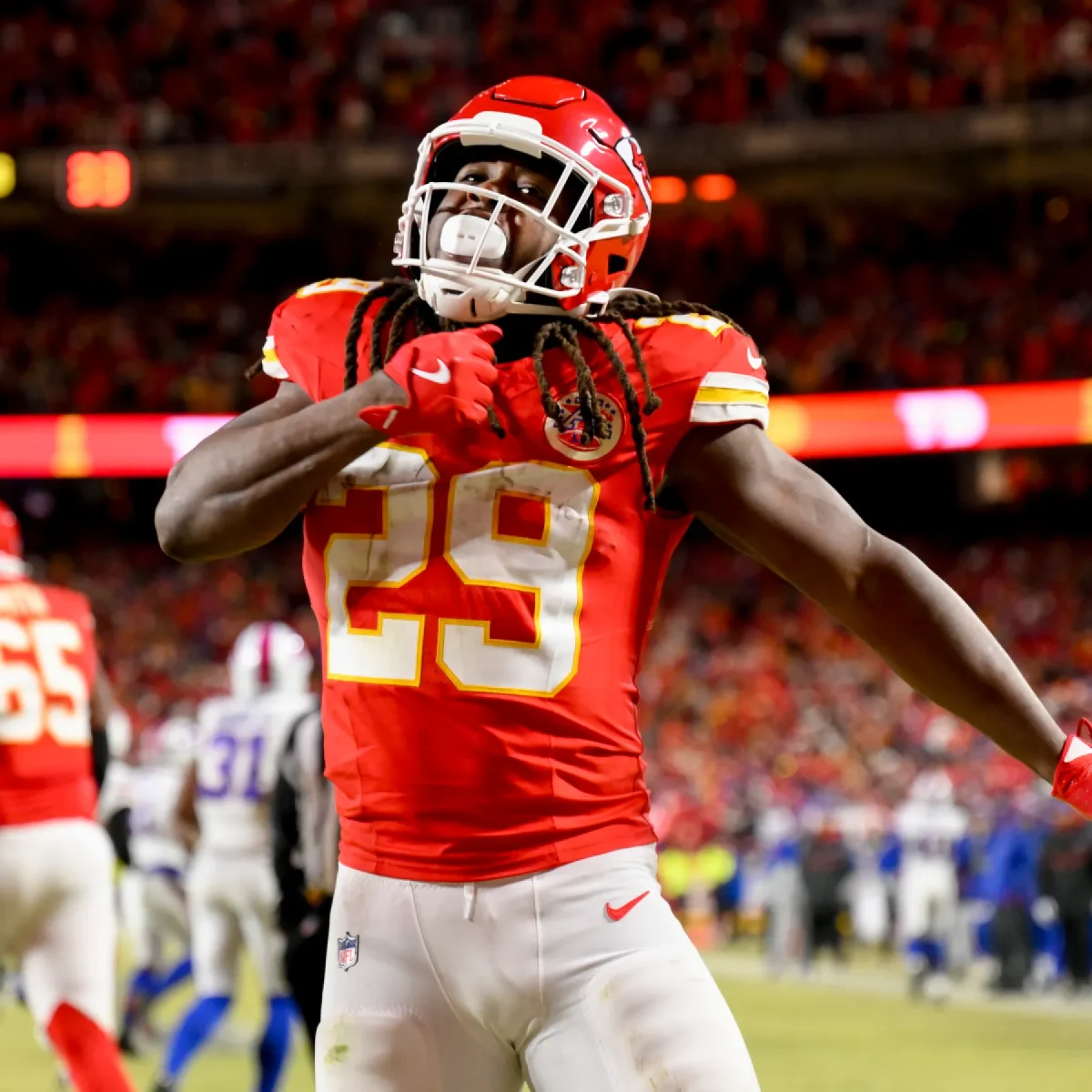 Kareem Hunt celebrates a touchdown against the Bills in last year's playoff matchup (News-Herald)